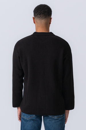 Polo a maniche lunghe a maglia - Nero