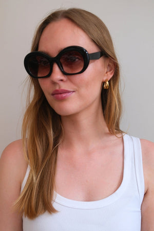 Occhiali da sole Sara - nero/marrone